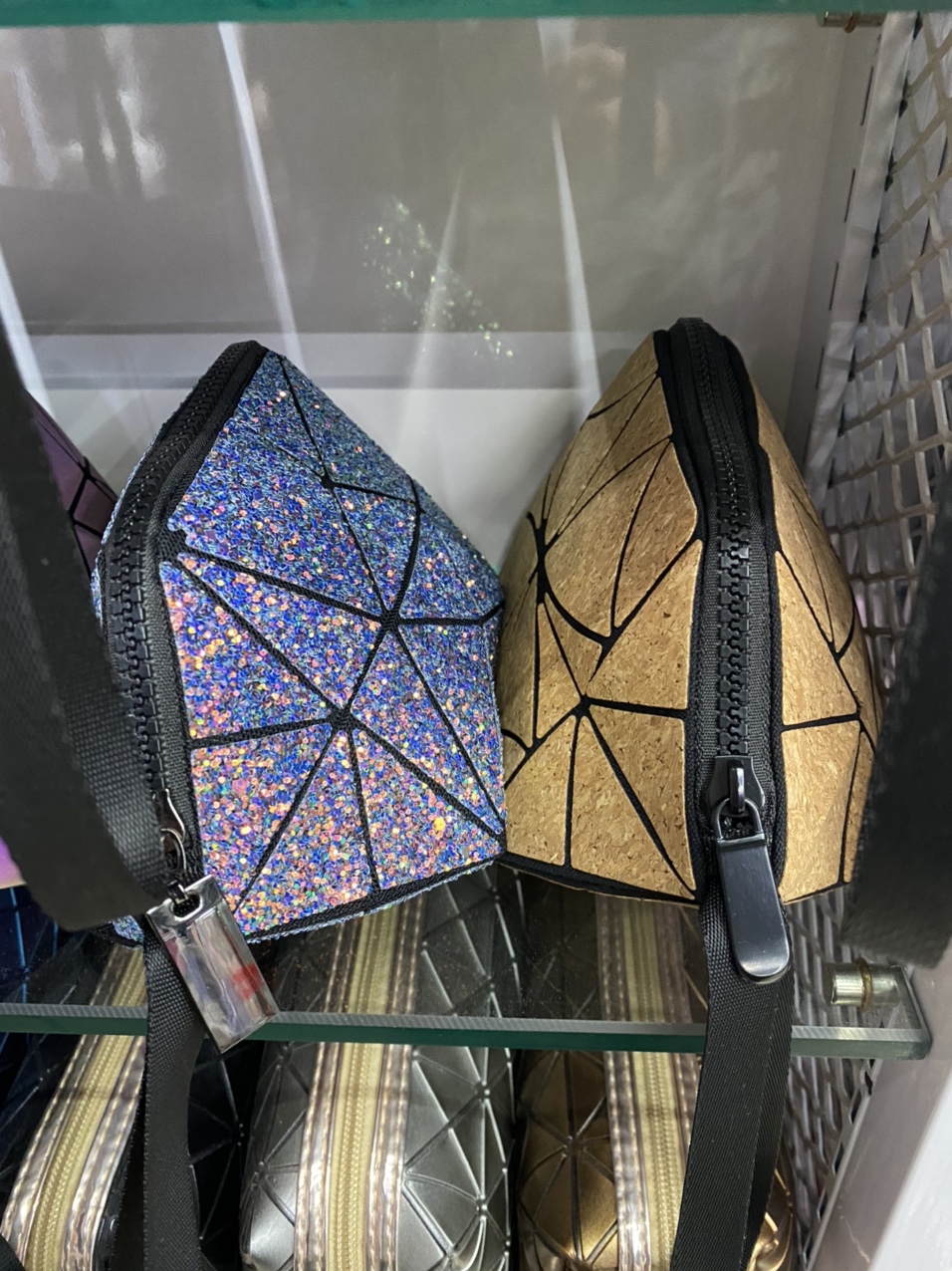 Triangular sequined cosmetic bag