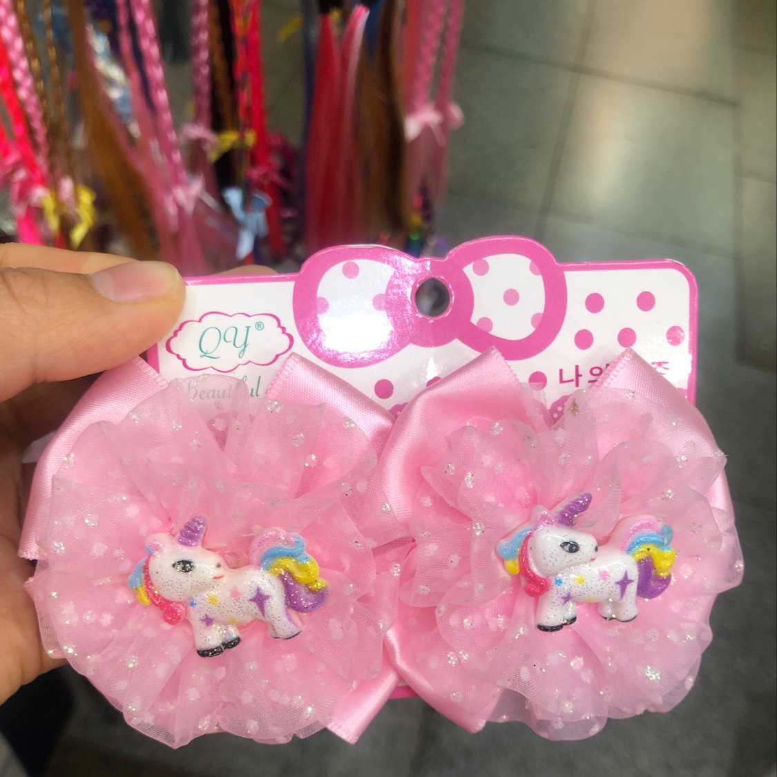 A unicorn with a bow on it thumbnail