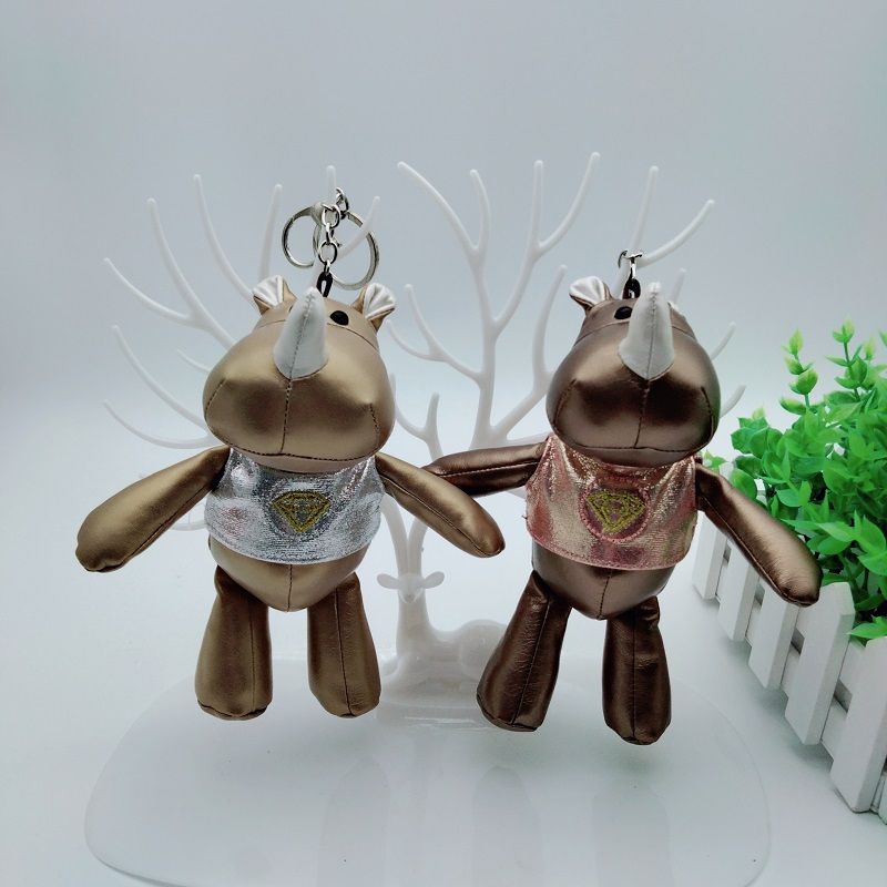 New PU Pipi rhino keychain pendant cute cartoon calf figure student backpack pendant wholesale