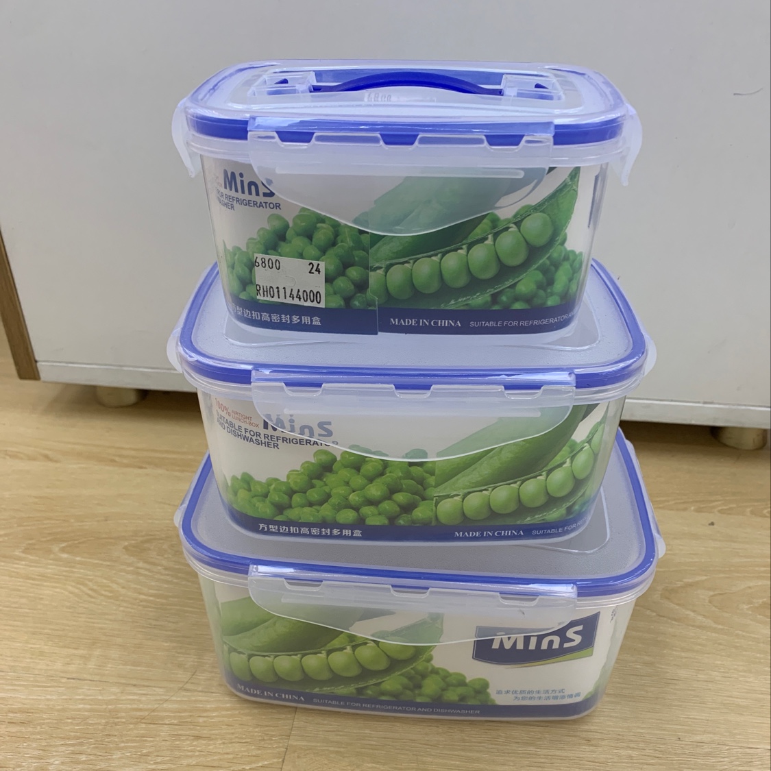 Three-piece set of food storage containers. full figure