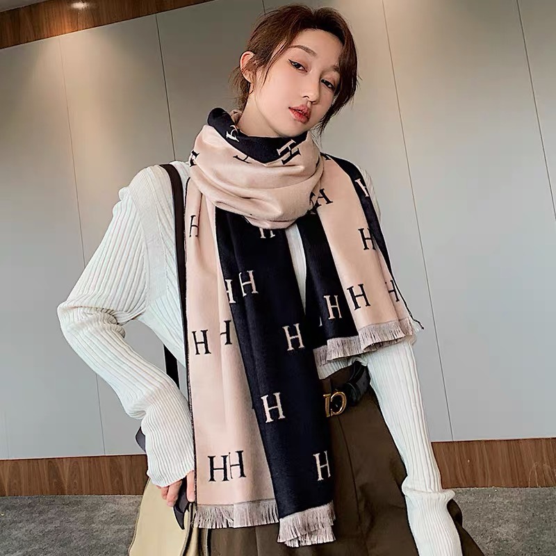 The oversized, warm and thick scarf is versatile