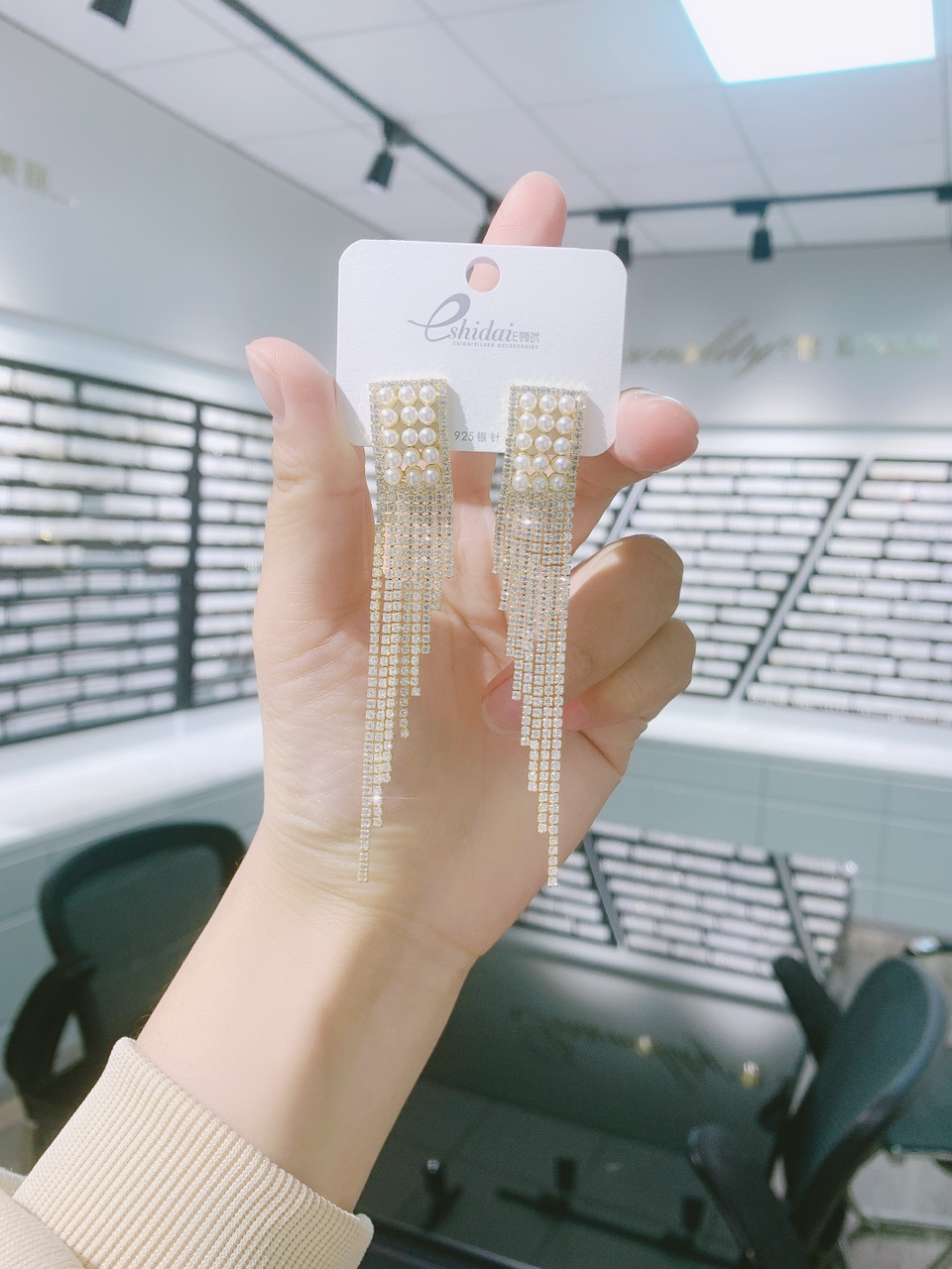 It's A High-End Long Fringe Earpiece