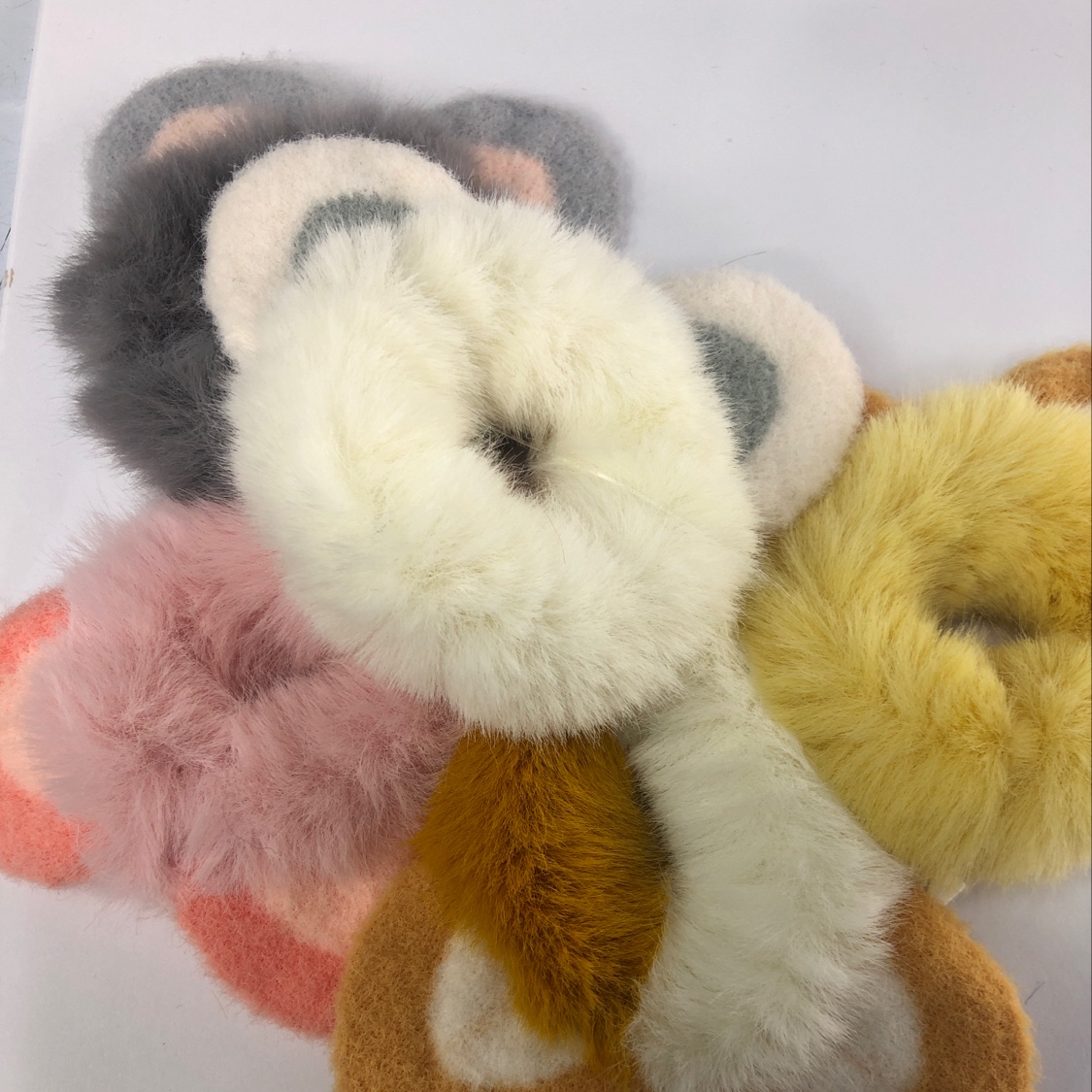 Knitted furry ears and plush hair ties full figure