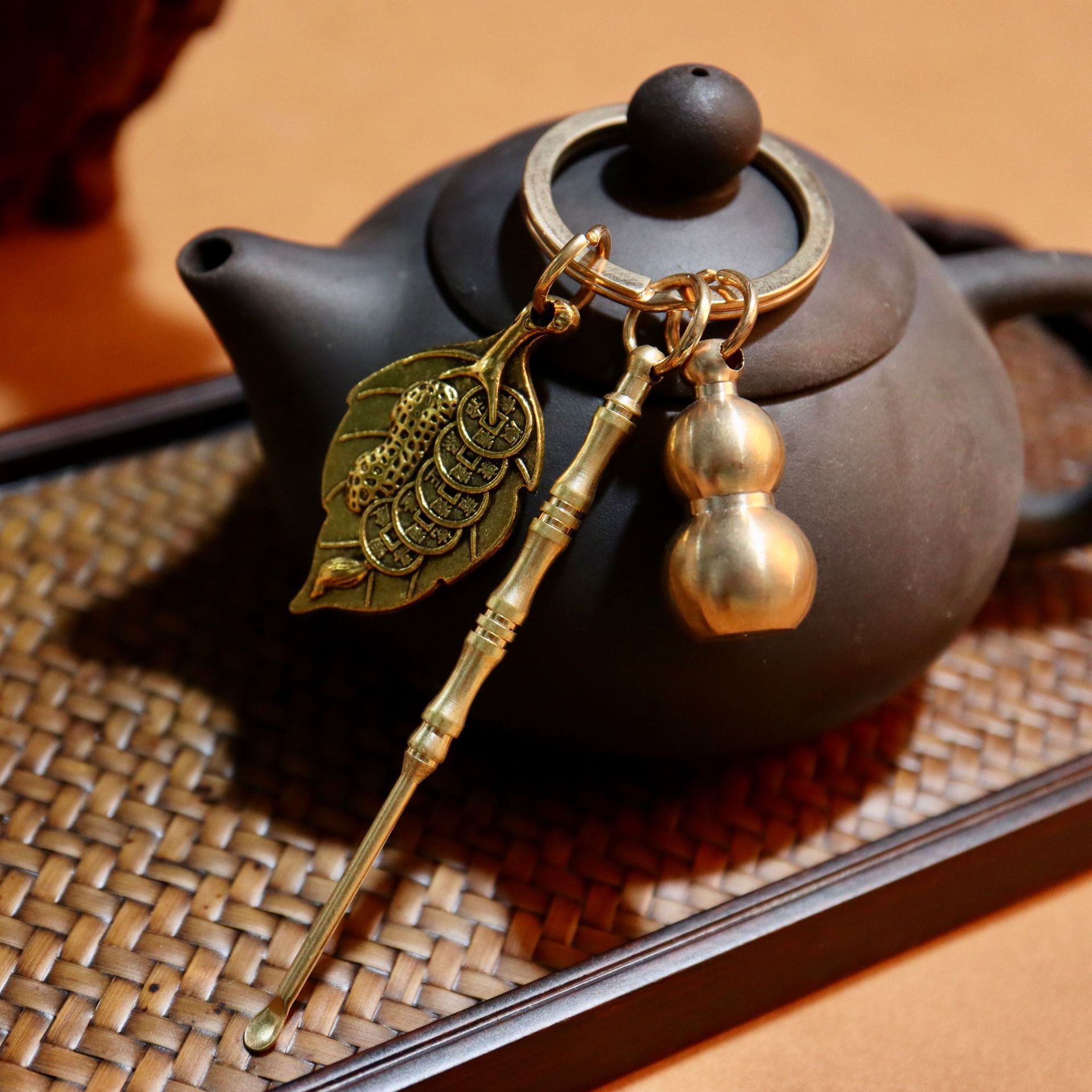 Wholesale of keychains, solid brass small gourds, car hangers, personalized and exquisite leaf brass bamboo joint ear spoon accessories