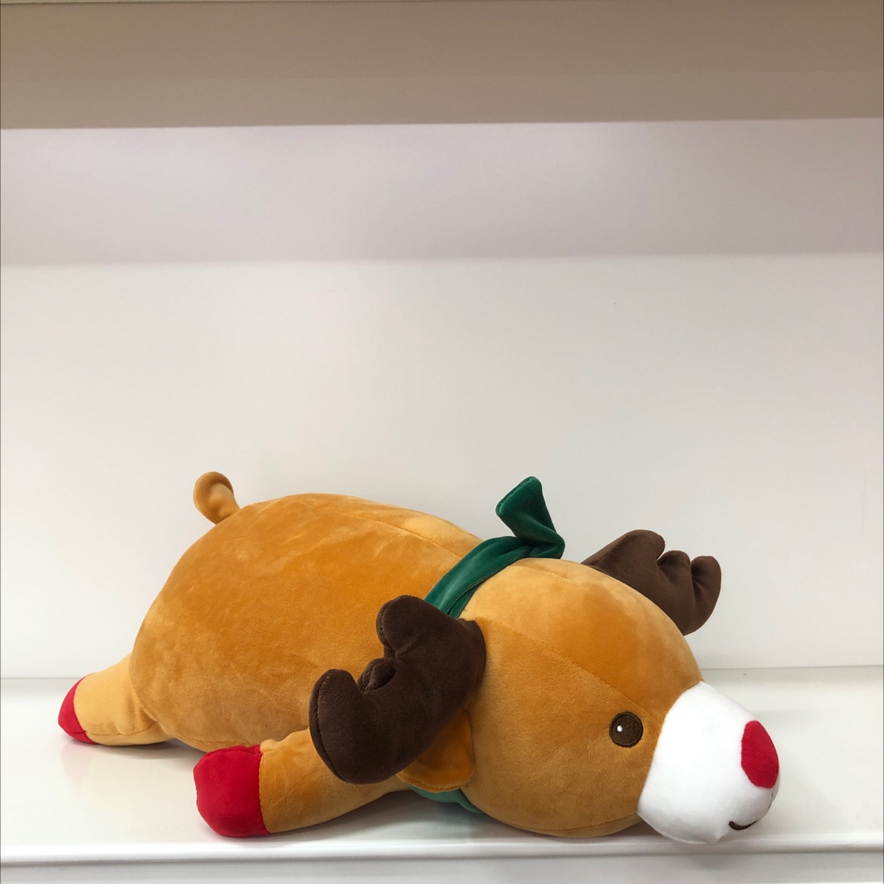 Plush reindeer throw pillow