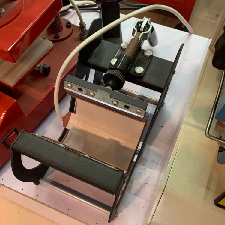 Cup ironing machine