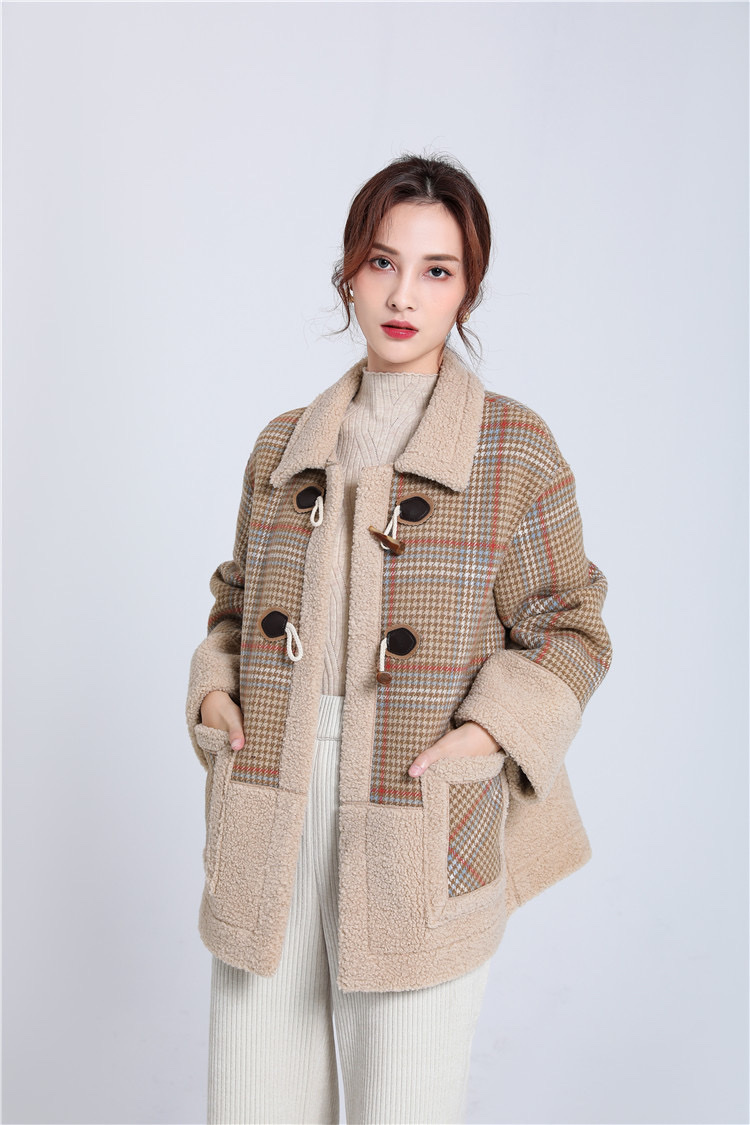 Jimmy Seio's 2020 winter collection features a mid-length khaki checkered wool coat undefined