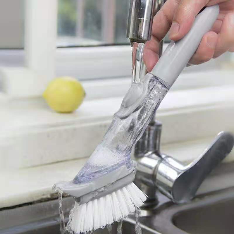 A versatile kitchen dishwashing and scrubbing tool that won't damage the pot. It features a long-handled sponge with automatic liquid addition for cleaning and scrubbing Item Picture