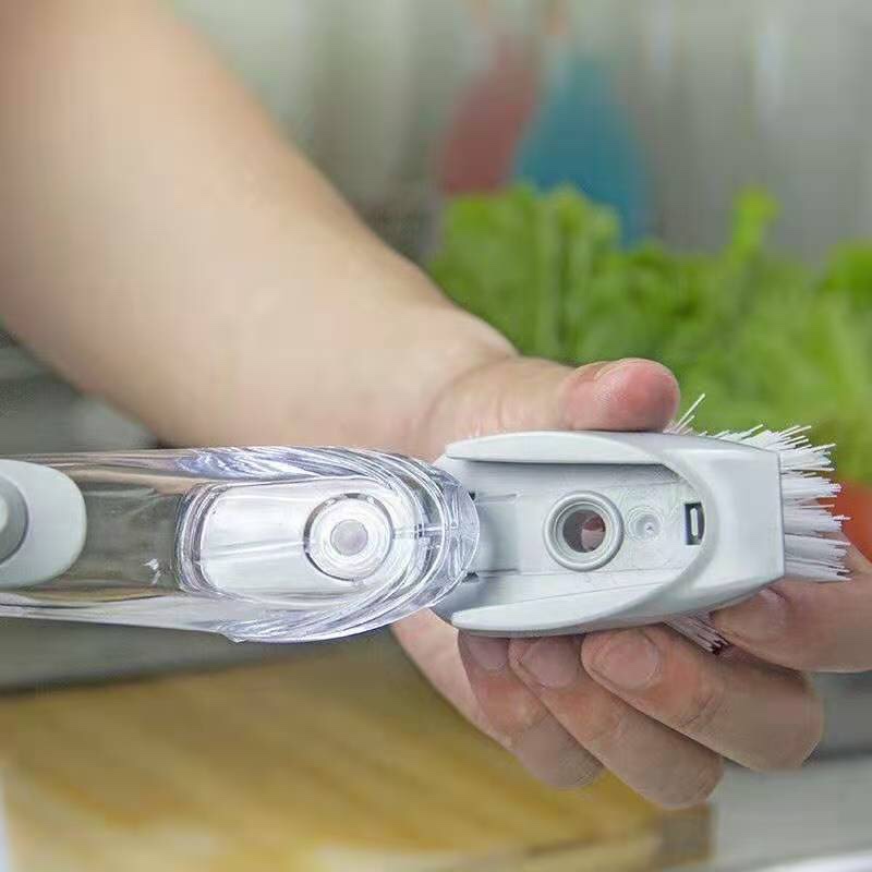A versatile kitchen dishwashing and scrubbing tool that won't damage the pot. It features a long-handled sponge with automatic liquid addition for cleaning and scrubbing details Picture