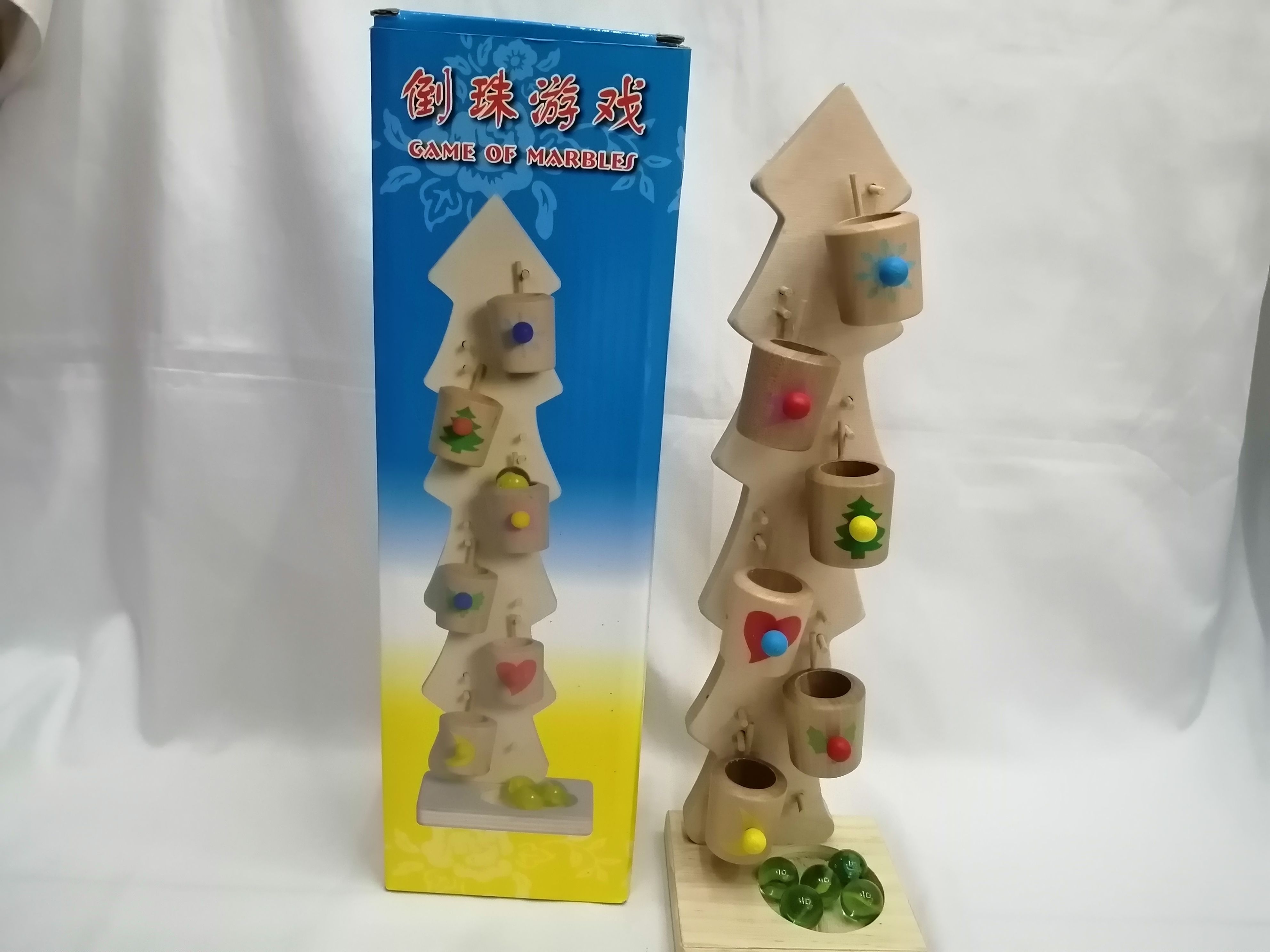 Montessori Early Education Center's marbles, parent-child games, six-tube ball rolling, physical inertia, and educational wooden toys for children