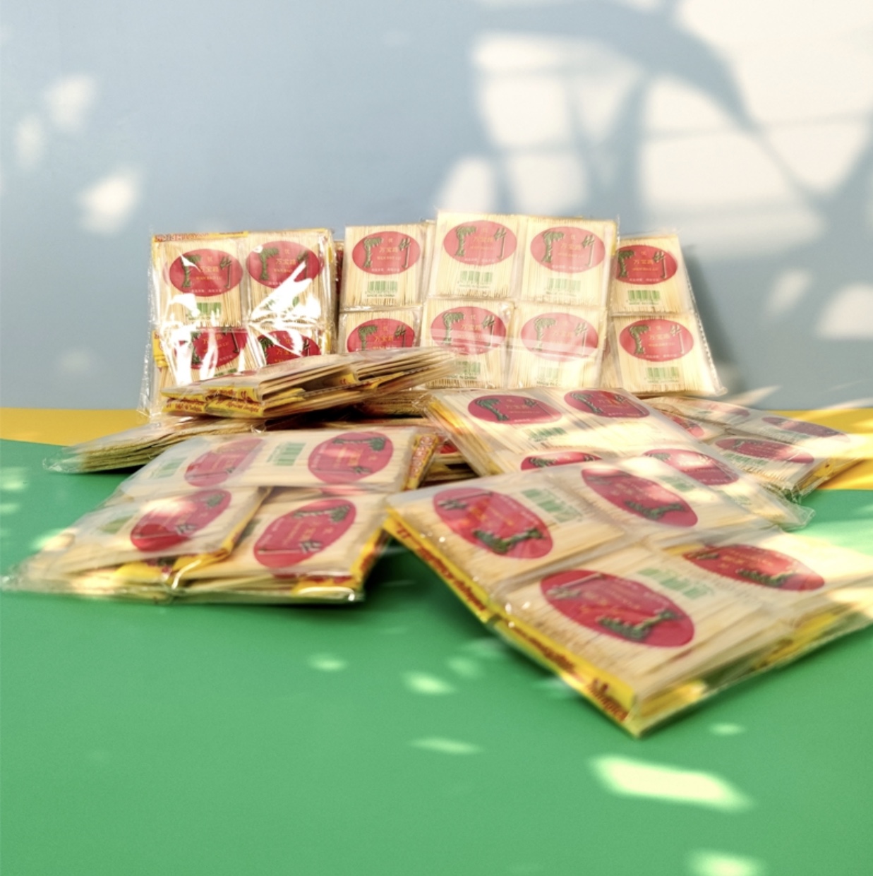 Twenty small packets of toothpicks