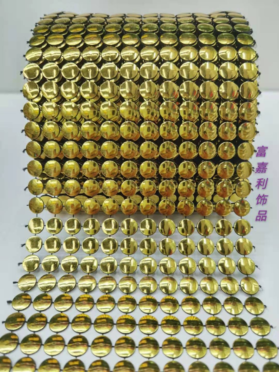 12 rows of semi-circular black background with gold foil