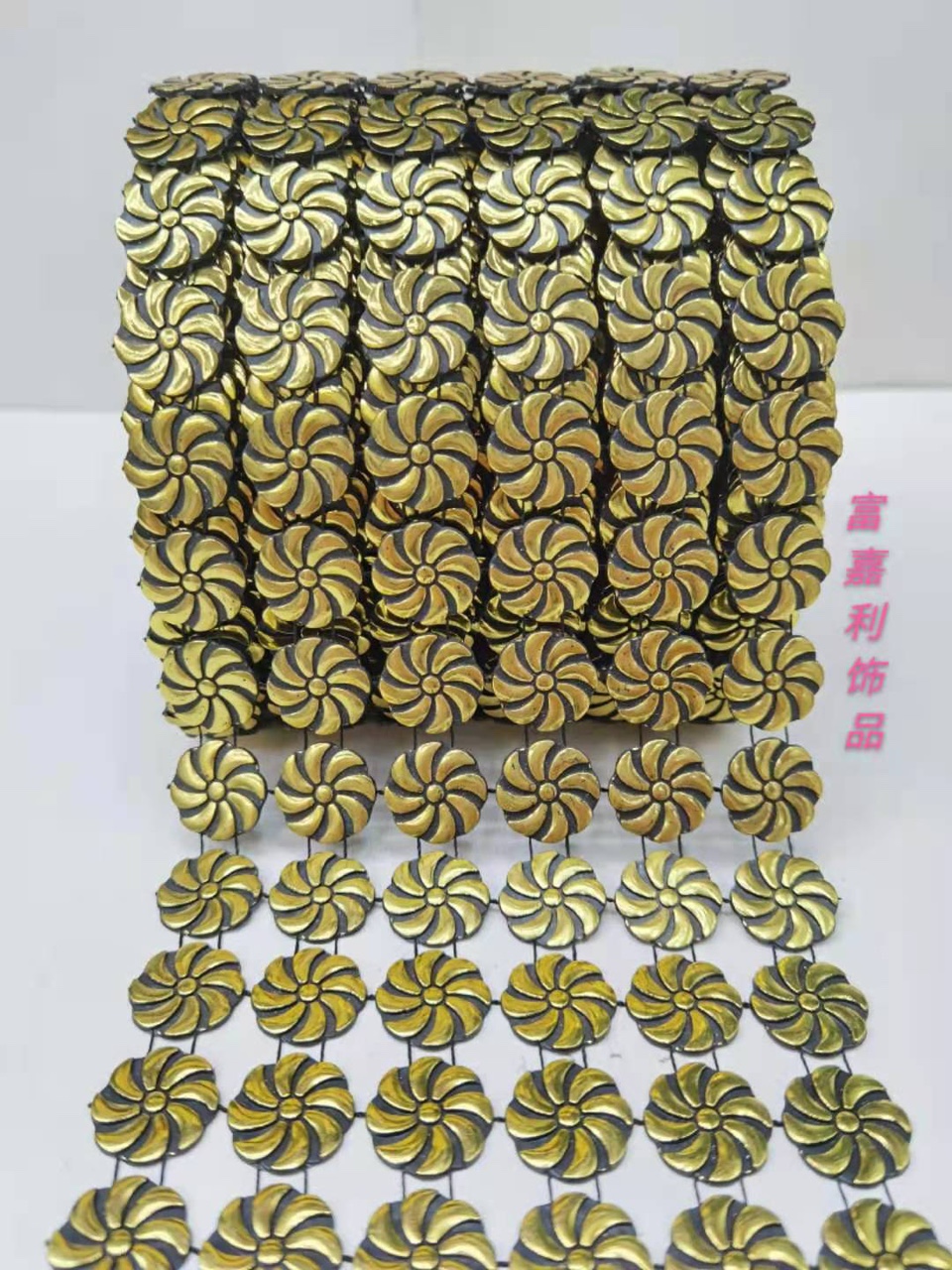 The six rows of flywheels are black with gold foil