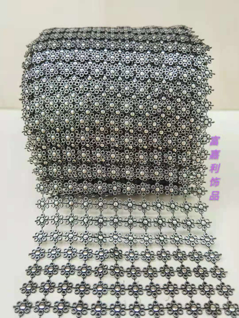 12 rows of small plum blossoms with black background and silver foil