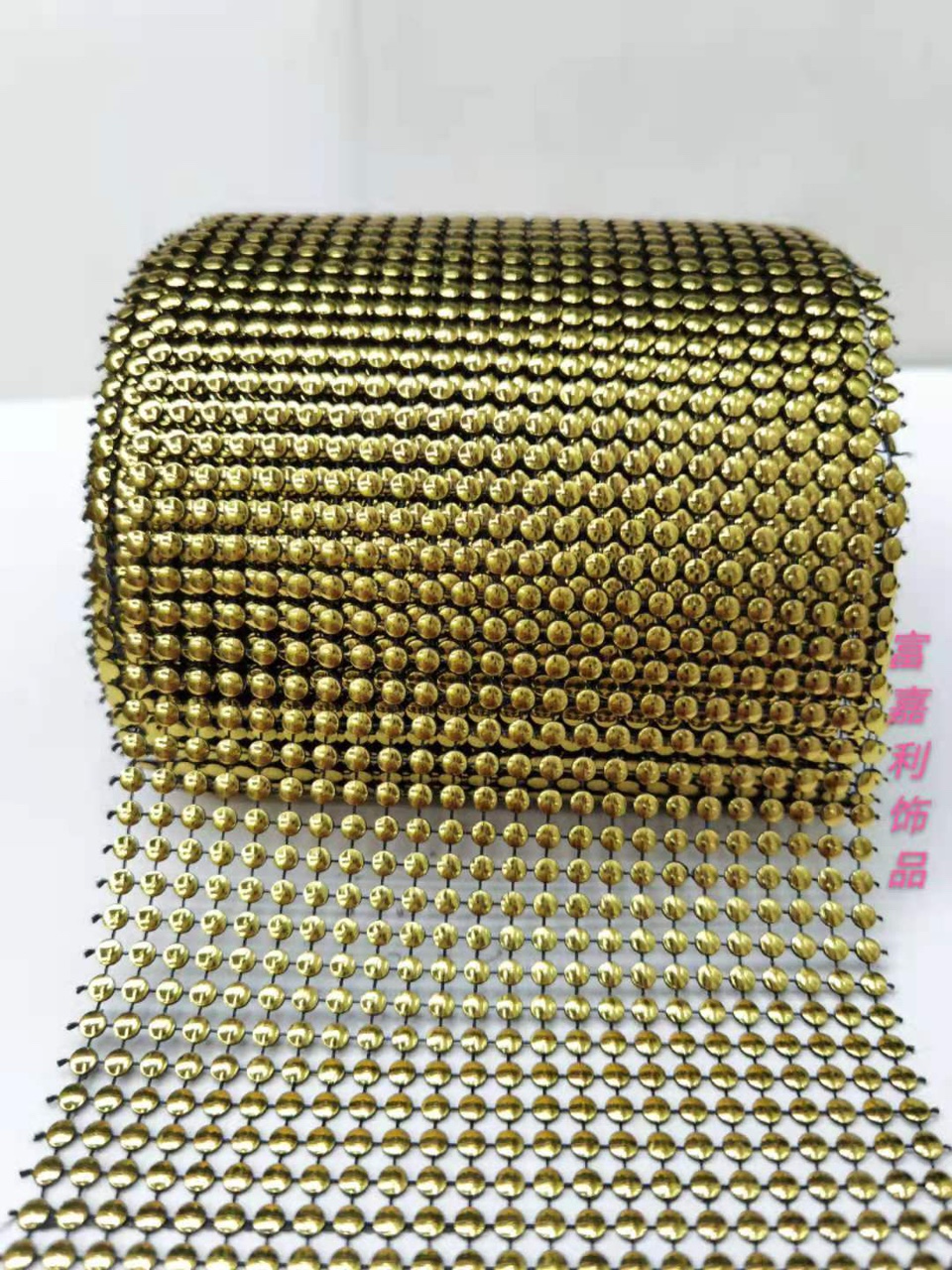 24 rows of semi-circular black background with gold foil