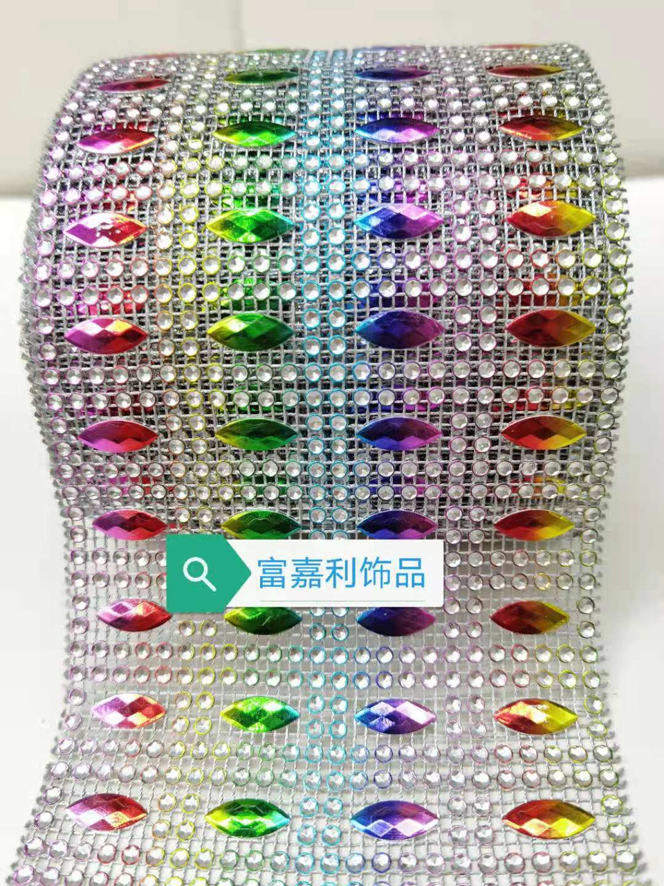 Four rows of diamond-encrusted silver backgrounds with seven colors