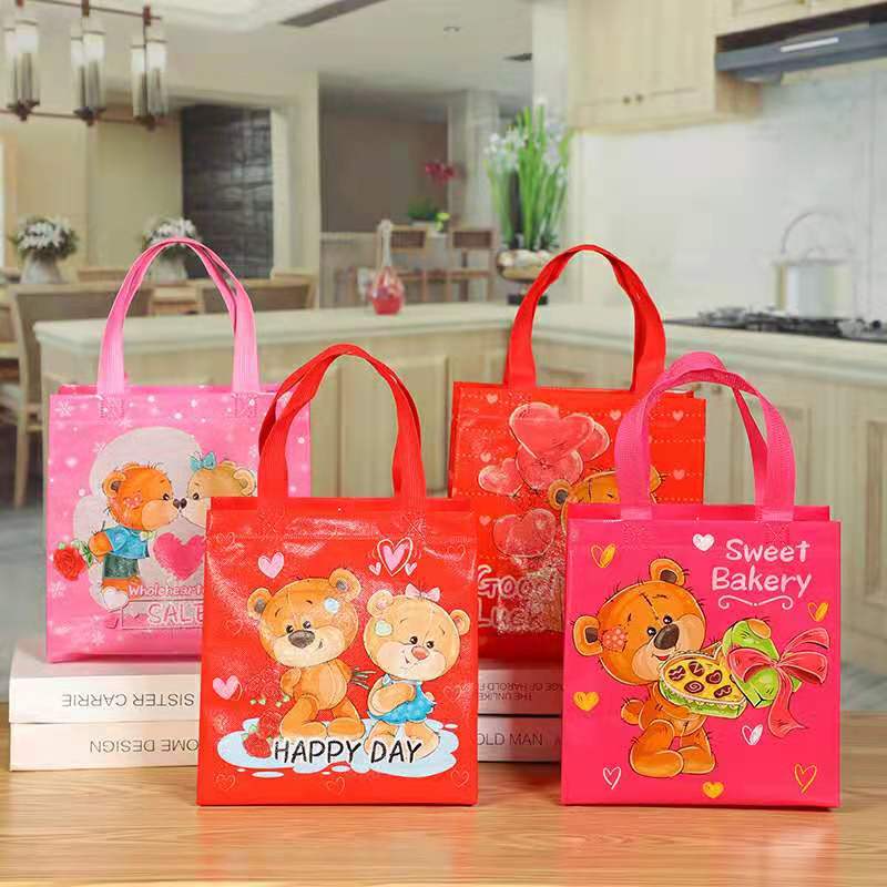 Hand - held printed non-woven bag, small three-dimensional color plastic mulch shopping bag, custom folding clothing gift bag thumbnail