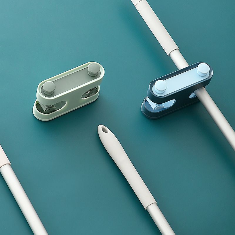 Multi-functional wall-mounted, no need for drilling, space-saving, double slots with 2 hooks, traceless mop clamp, toilet brush, broom slot details Picture