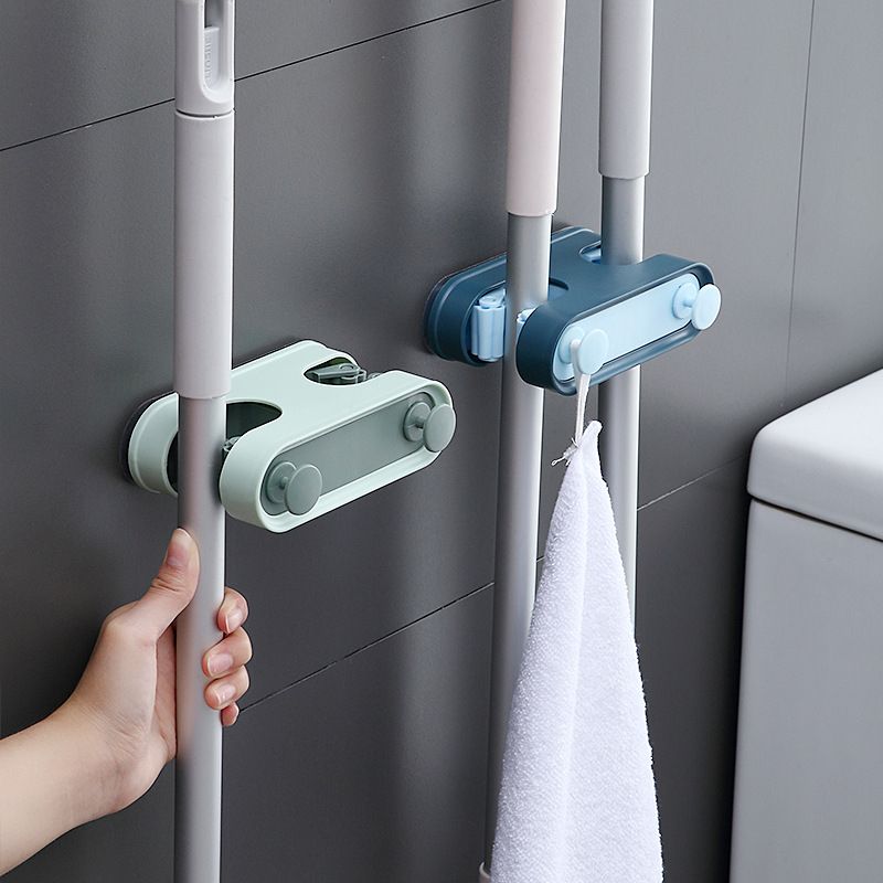 Multi-functional wall-mounted, no need for drilling, space-saving, double slots with 2 hooks, traceless mop clamp, toilet brush, broom slot Application Scenario