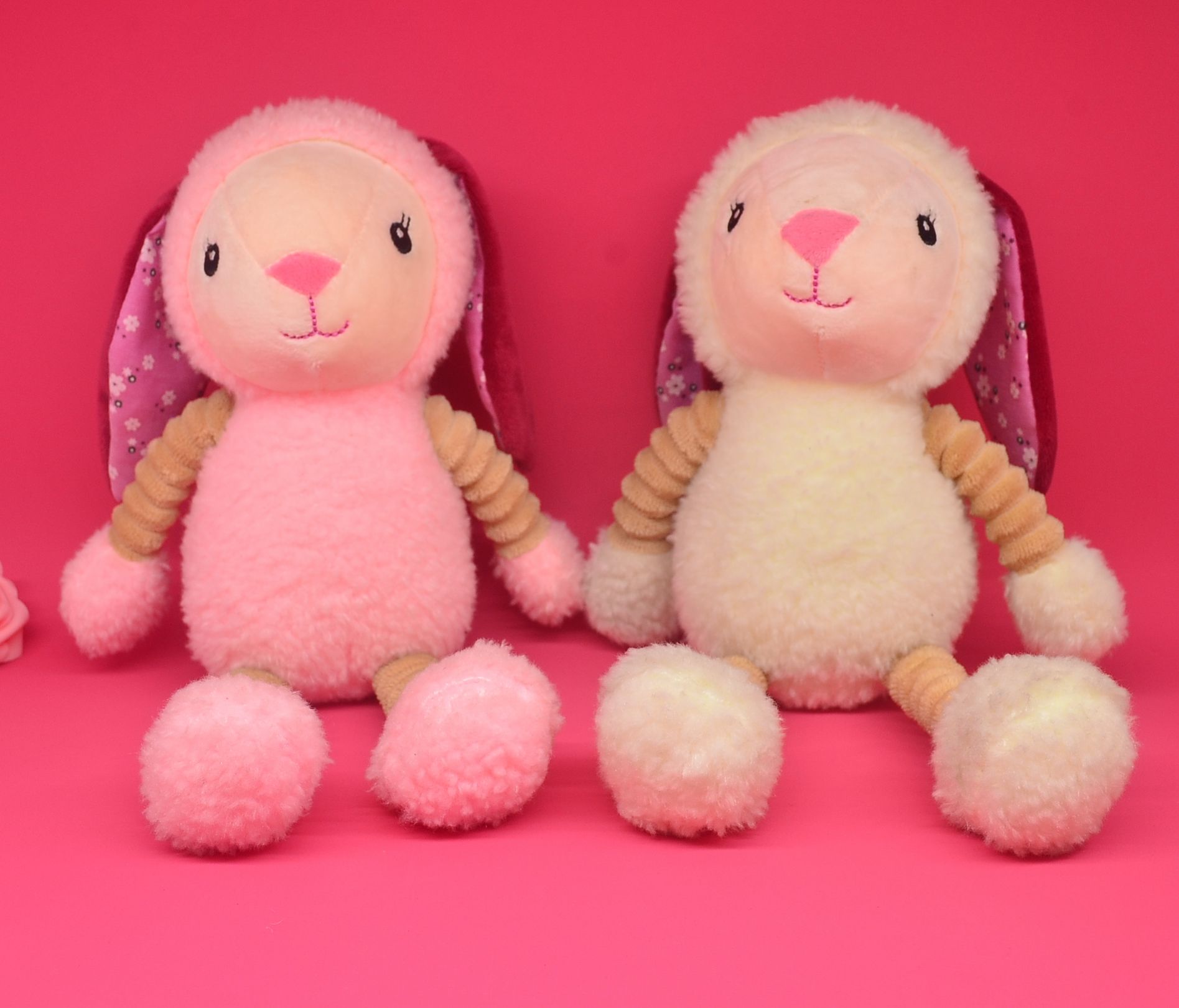 Cartoon rabbit stuffed toy with stilted flower toys