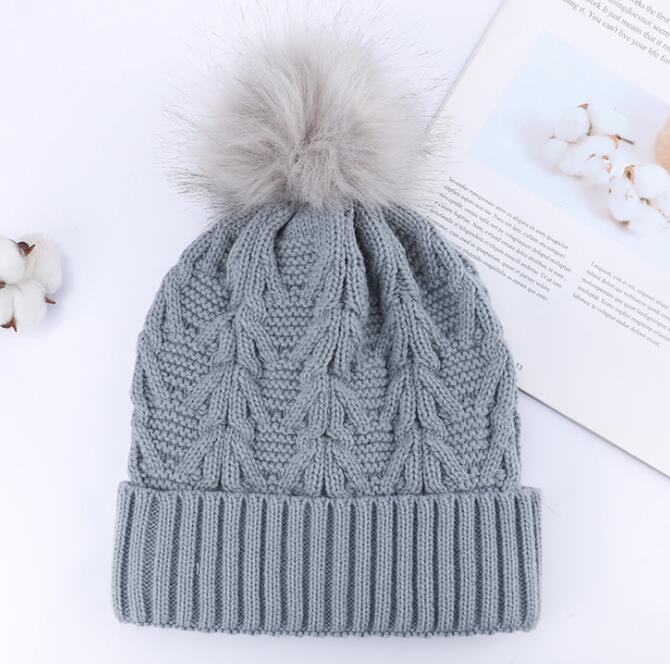 2020 Cross-border hot woolen hat with hairball knitted hat solid color warm winter knitted hat first-hand supply full figure