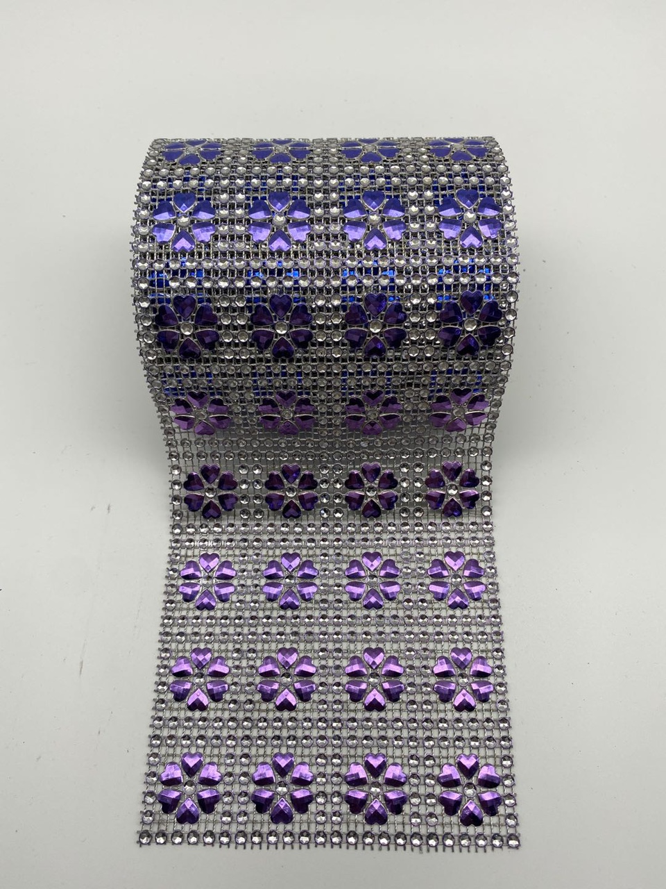 Four rows of flower pieces with reverse diamond, silver background with hot eggplant purple