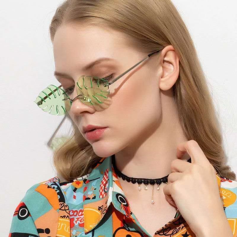 新款无框个性叶子太阳镜 女舞台走秀百搭搞怪网红无框墨镜细节图
