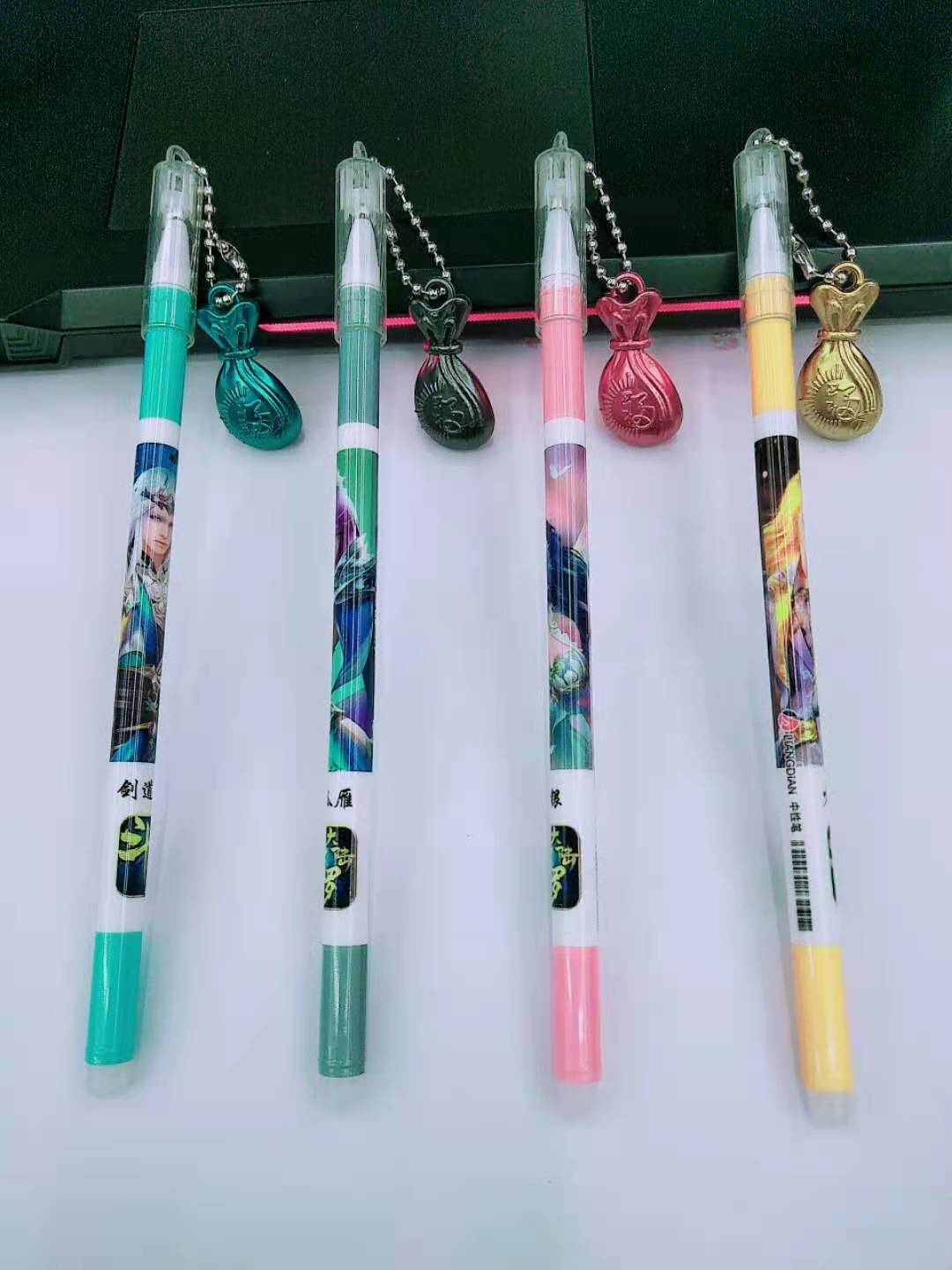 创意福袋挂件中性笔 卡通杆钱袋挂件黑色中性笔学生用笔 签字笔