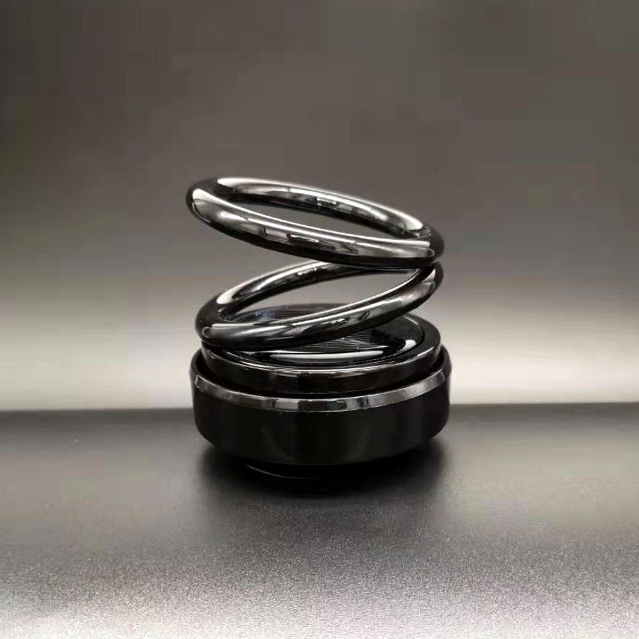Wholesale of solar plastic double-ring suspended rotating aroma diffuser base, creative automotive supplies, solar rotating ornaments Application Scenario
