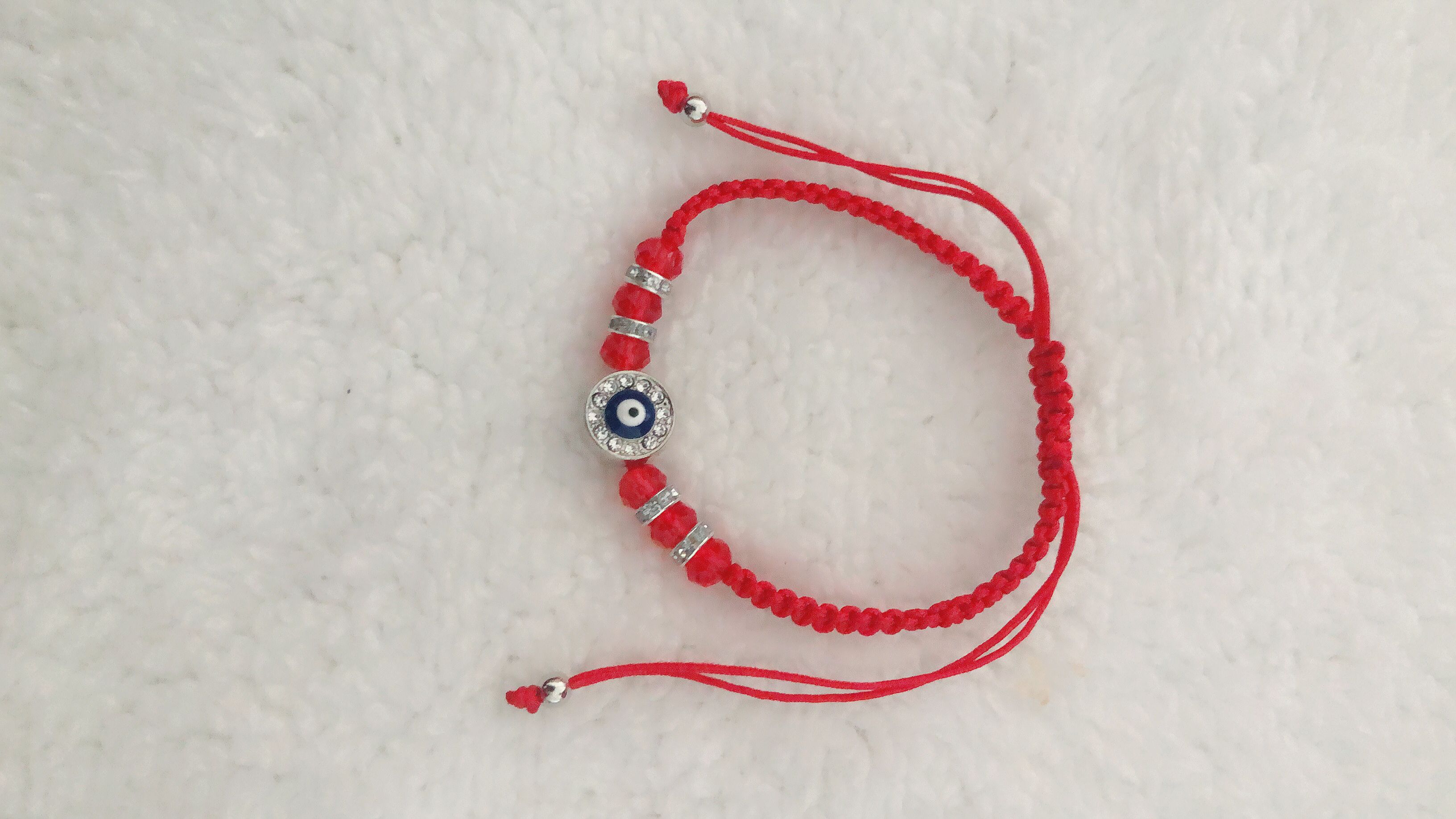 Braided bracelet with flat knot crystal plus alloy dot diamond eyes round on one side thumbnail