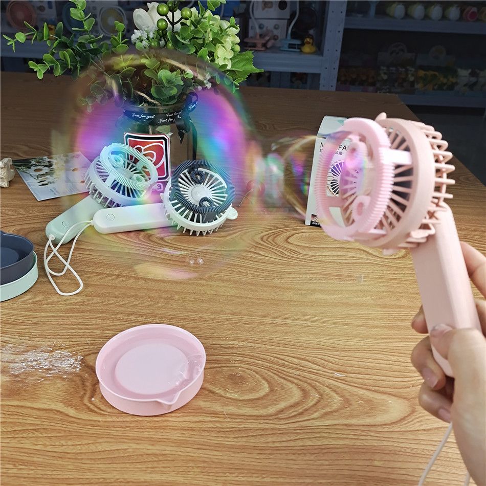 Tik Tok is the same kid's toy with a rechargeable automatic bubble gun fan