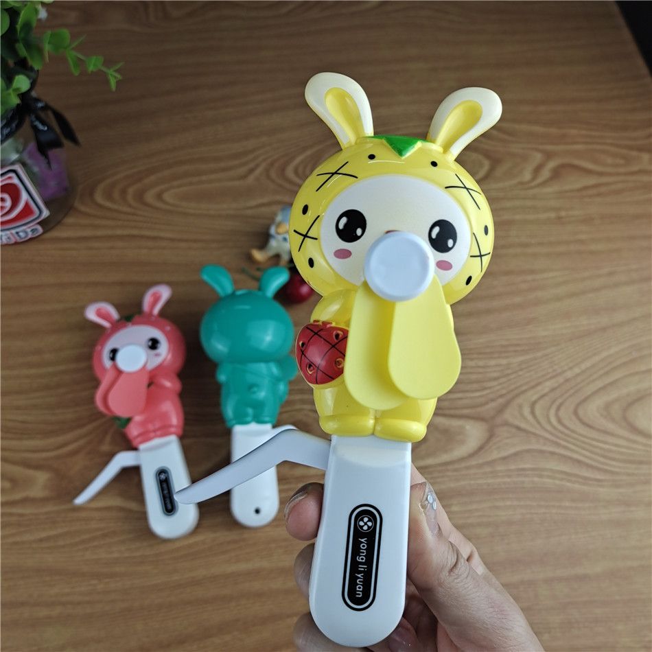Hand-pressed baby hand-held small fan portable portable hand-held children and students hand-pressed fruit rabbit fan