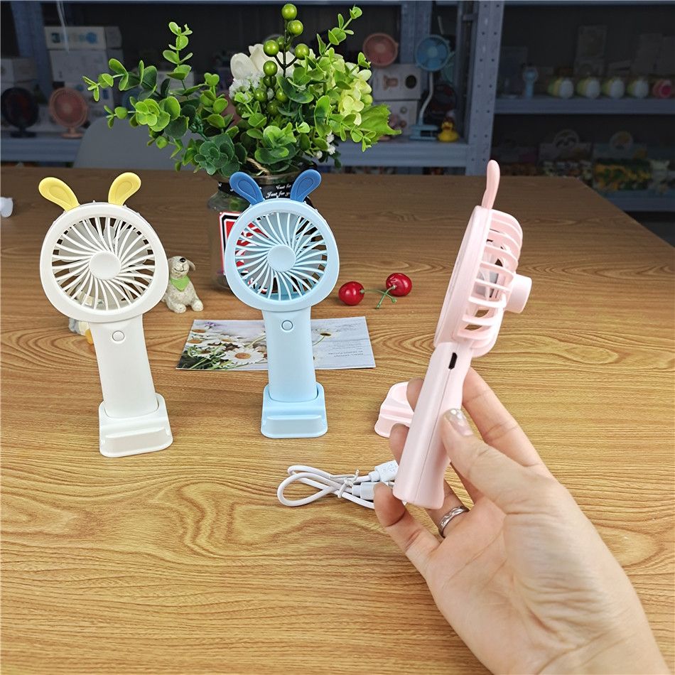 Small hand-held portable carry-on small student USB Mini rechargeable fan Hand kids cute fan