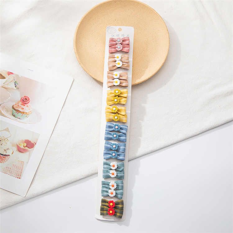 Korean fashion fabric bow duck clip 202103020015