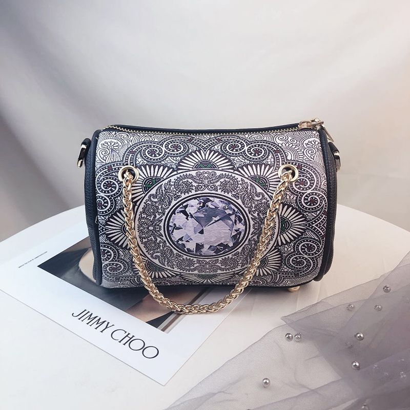 2021 new ethnic style leather shoulder bag retro hand bag girls round bucket fashion skew across thumbnail