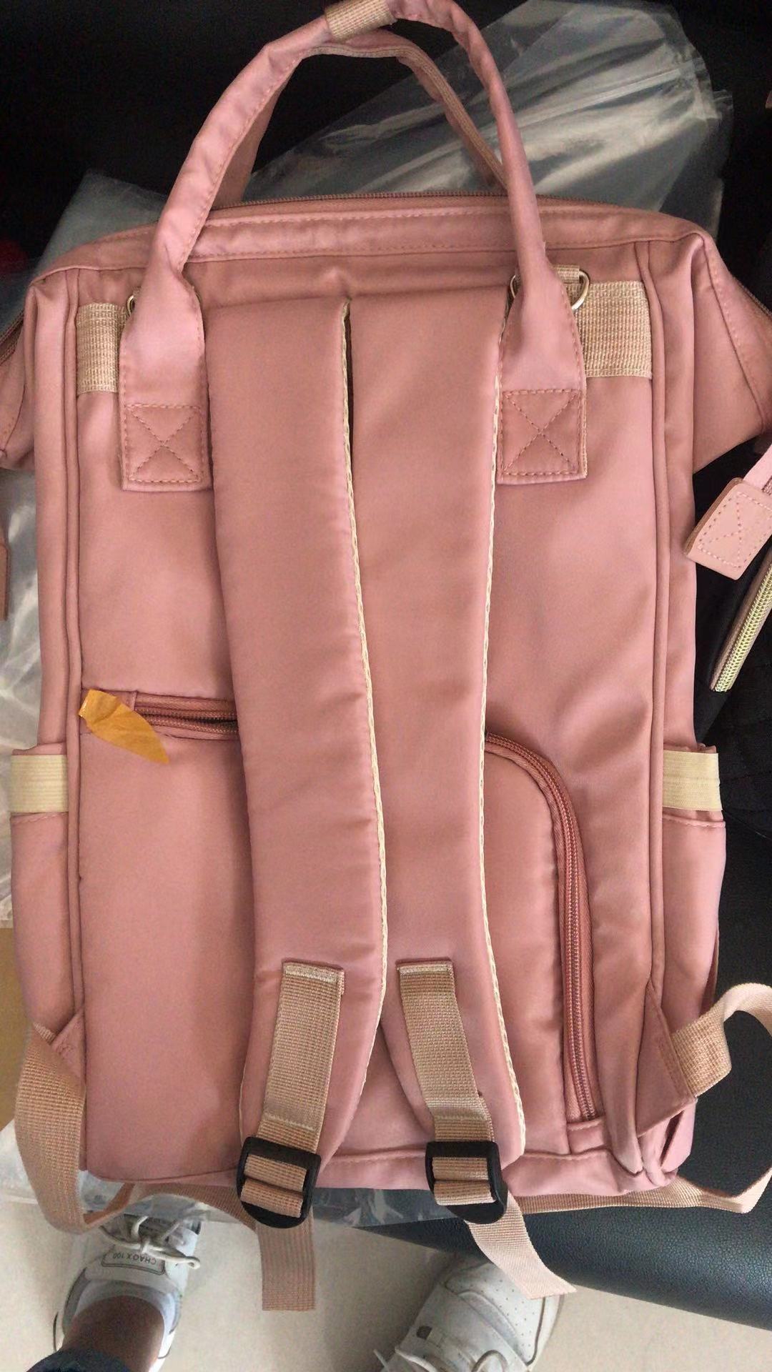 Mifei Korean version Backpack 2021 Trendy Girls' junior High school, Senior high school and college students' schoolbag tube, Japanese style casual backpack Application Scenario