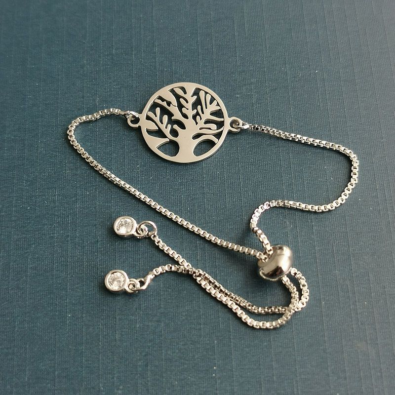 Factory wholesale personalized European and American style golden hollowed-out life tree pattern double-hole connection bracelet necklace accessories Specification image