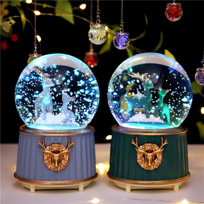 A deer accompanied by a crystal ball spinning floating snow light luxury wind water balloon music box birthday present details Picture