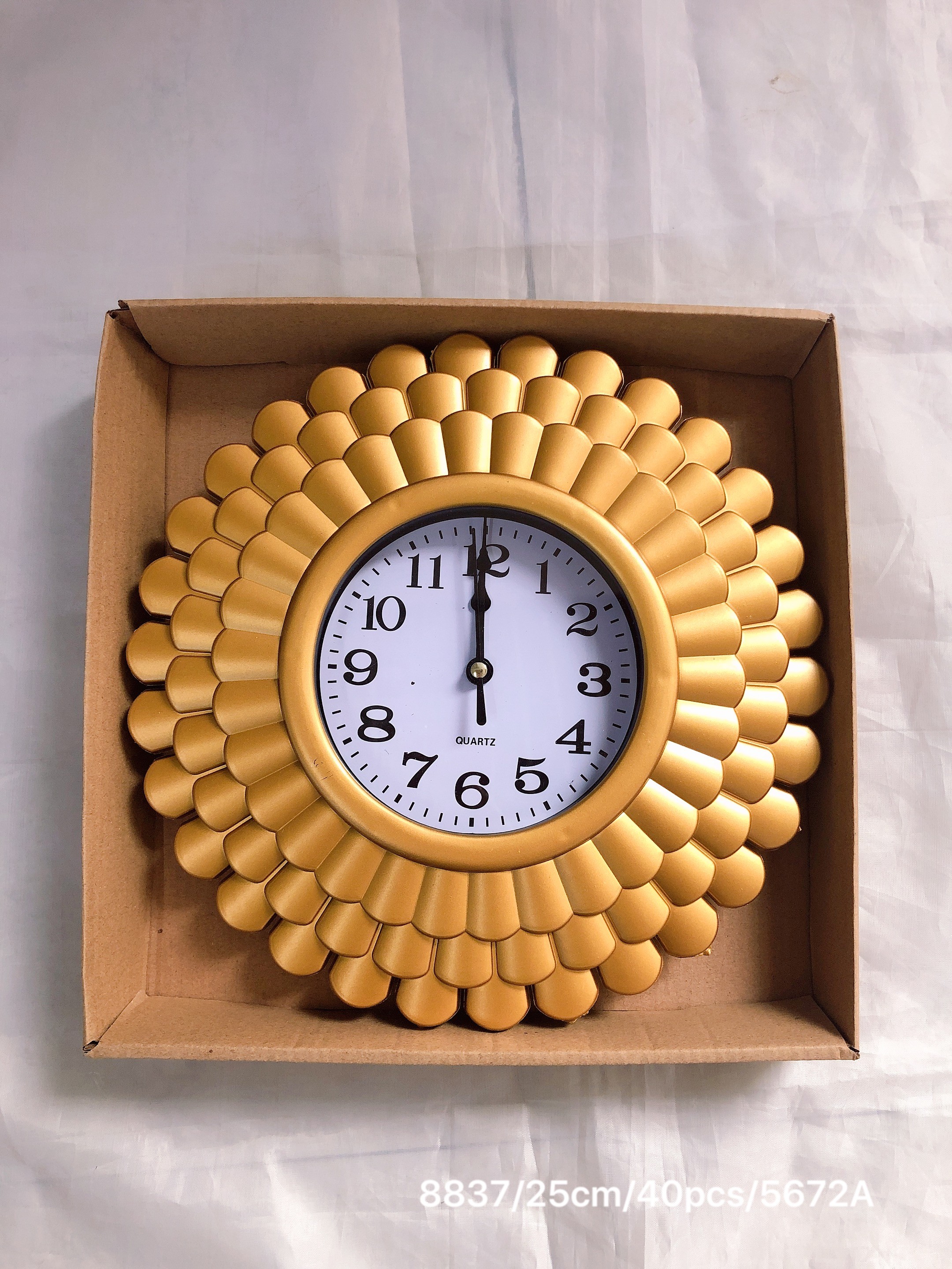 A 25cm wall clock with a retro hollowed-out quartz design for the living room detail image 2