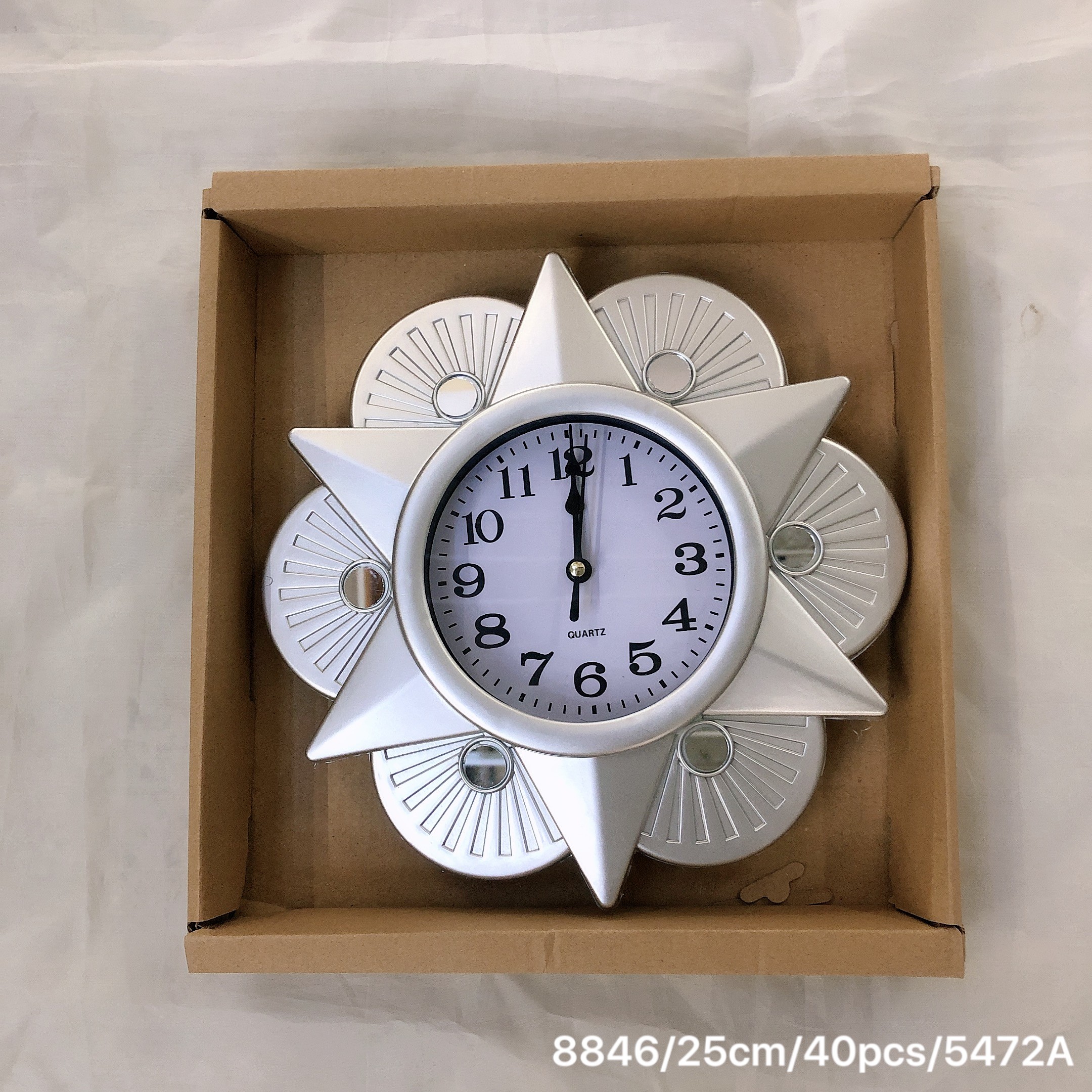 A 25cm wall clock with a retro hollowed-out quartz design for the living room detail image 6