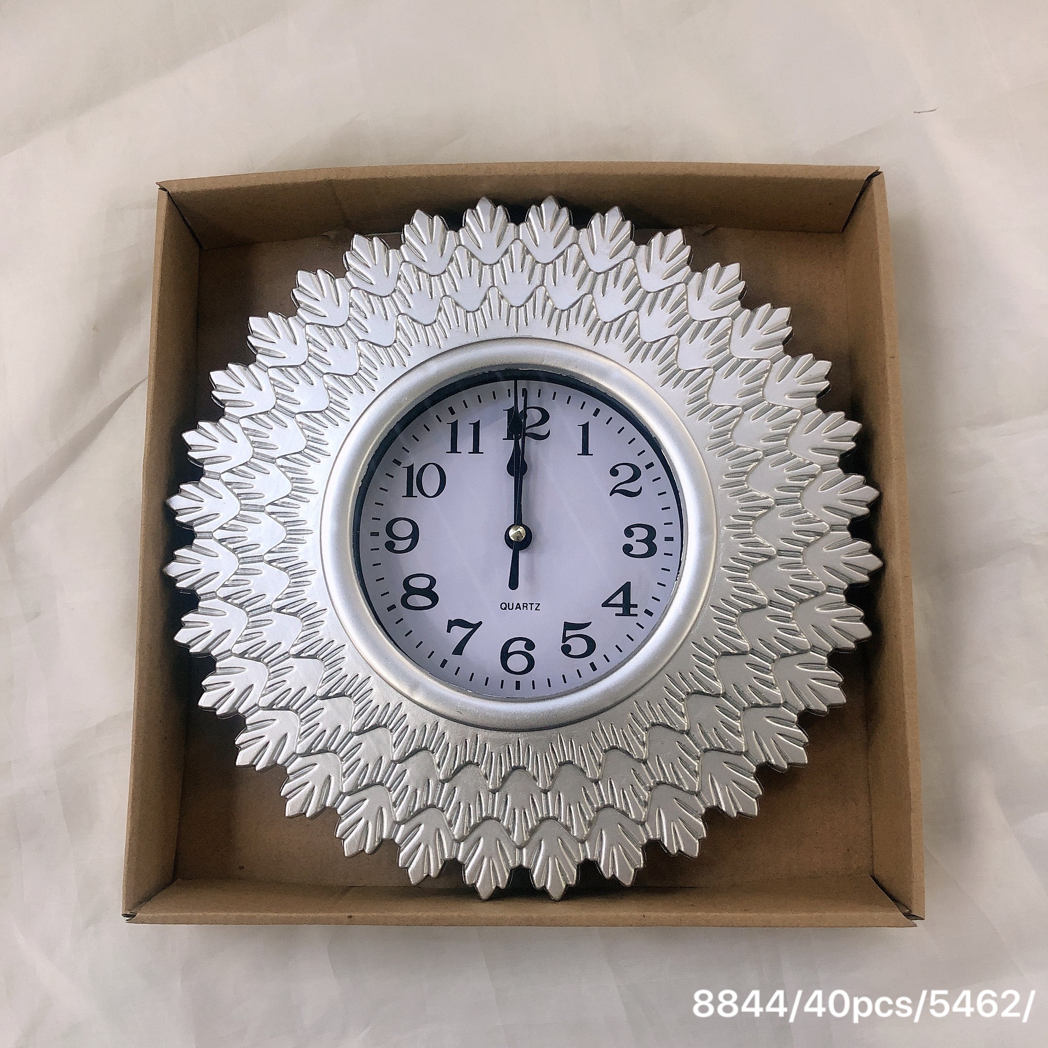 A 25cm wall clock with a retro hollowed-out quartz design for the living room detail image 9