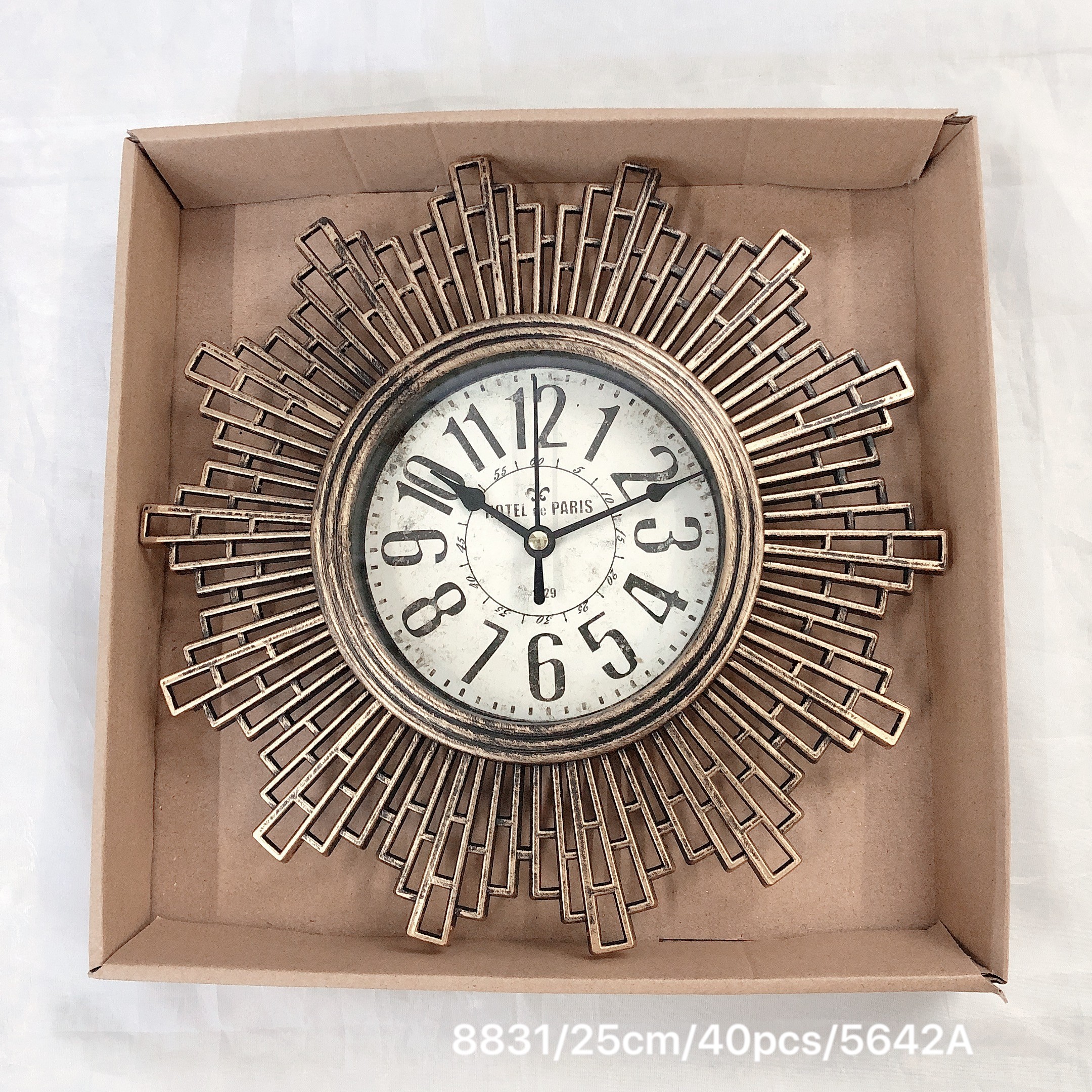 A 25cm wall clock with a retro hollowed-out quartz design for the living room detail image 3