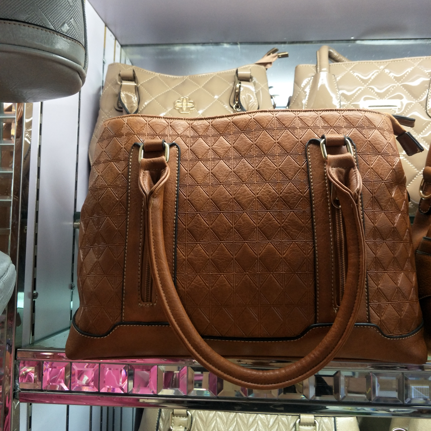 Women's fashionable large bag with embossed zippers on both sides
