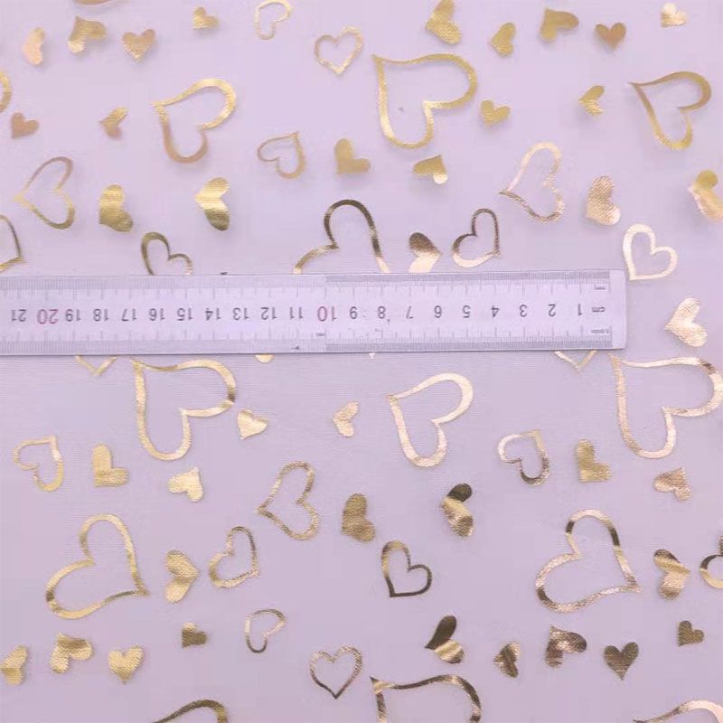 Gold-embossed heart-shaped soft mesh fabric, photo fabric, clothing fabric, stage costume, puffy skirt, DIY handicrafts, accessories Application Scenario