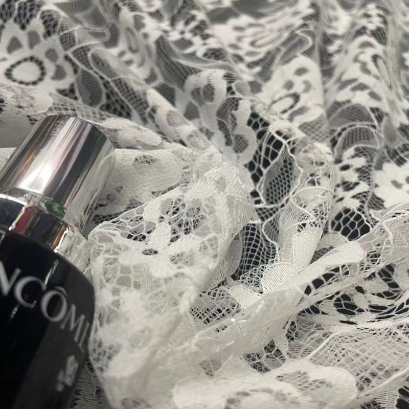 The new polyester fabric with regular hollowed-out distribution and fashionable flower-shaped lace fabric for women's clothing accessories is selling well details Picture