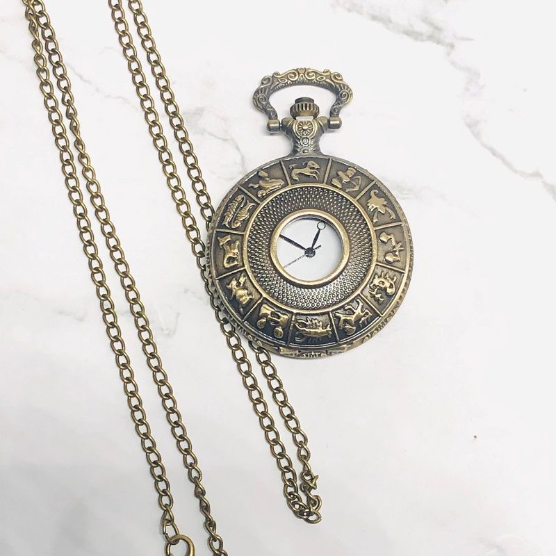 Creative 12 zodiac hollowed-out classic pocket watch with bracelet and retro color flip quartz watch Item Picture