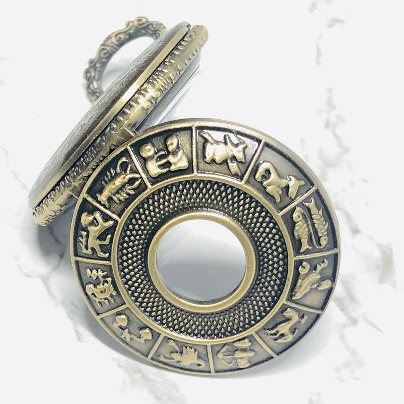 Creative 12 zodiac hollowed-out classic pocket watch with bracelet and retro color flip quartz watch Application Scenario