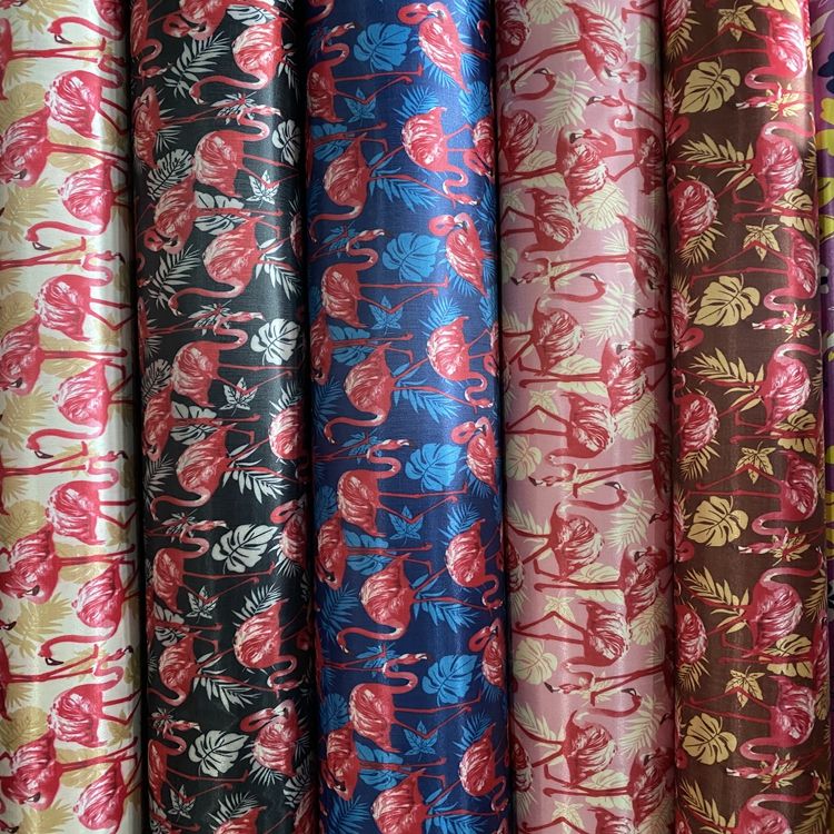 Yiwu Dada Seding Printing Flame Bird Factory directly sells a large quantity of stock and undertakes outsourcing of bag fabrics