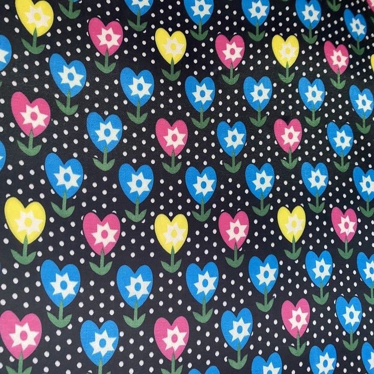 The color-printed series features 100% polyester fabric with a bottom PVC foam for printed heart saplings Specification image