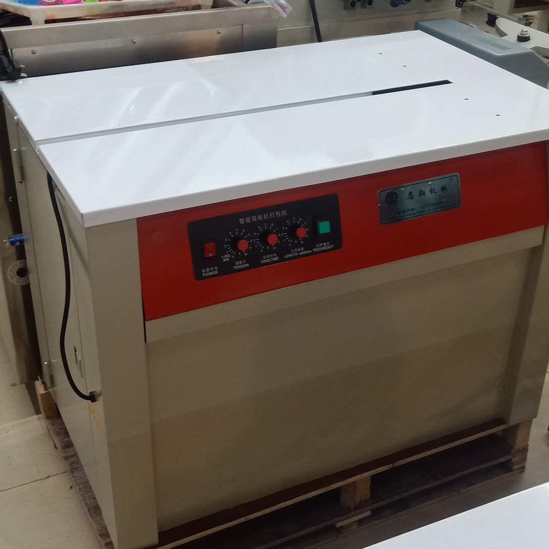 Semi-automatic high-platform strapping machine